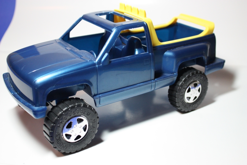 Image result for plastic toy trucks